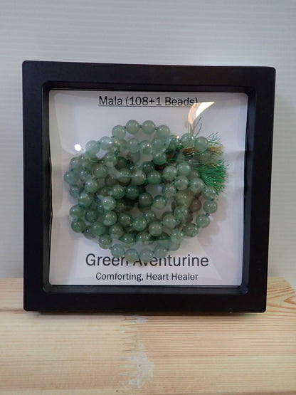 Green Aventurine Mala displayed in shadow box frame