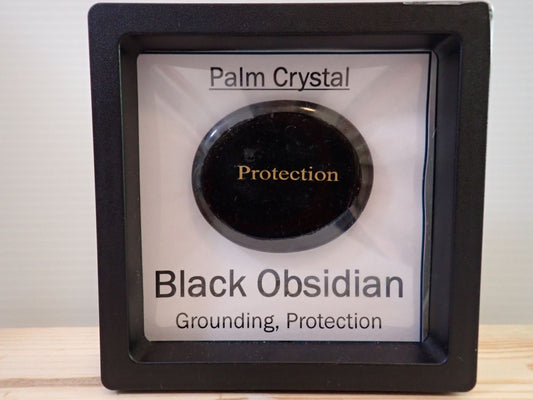Black Obsidian Palm Stone in floating display frame - Protection