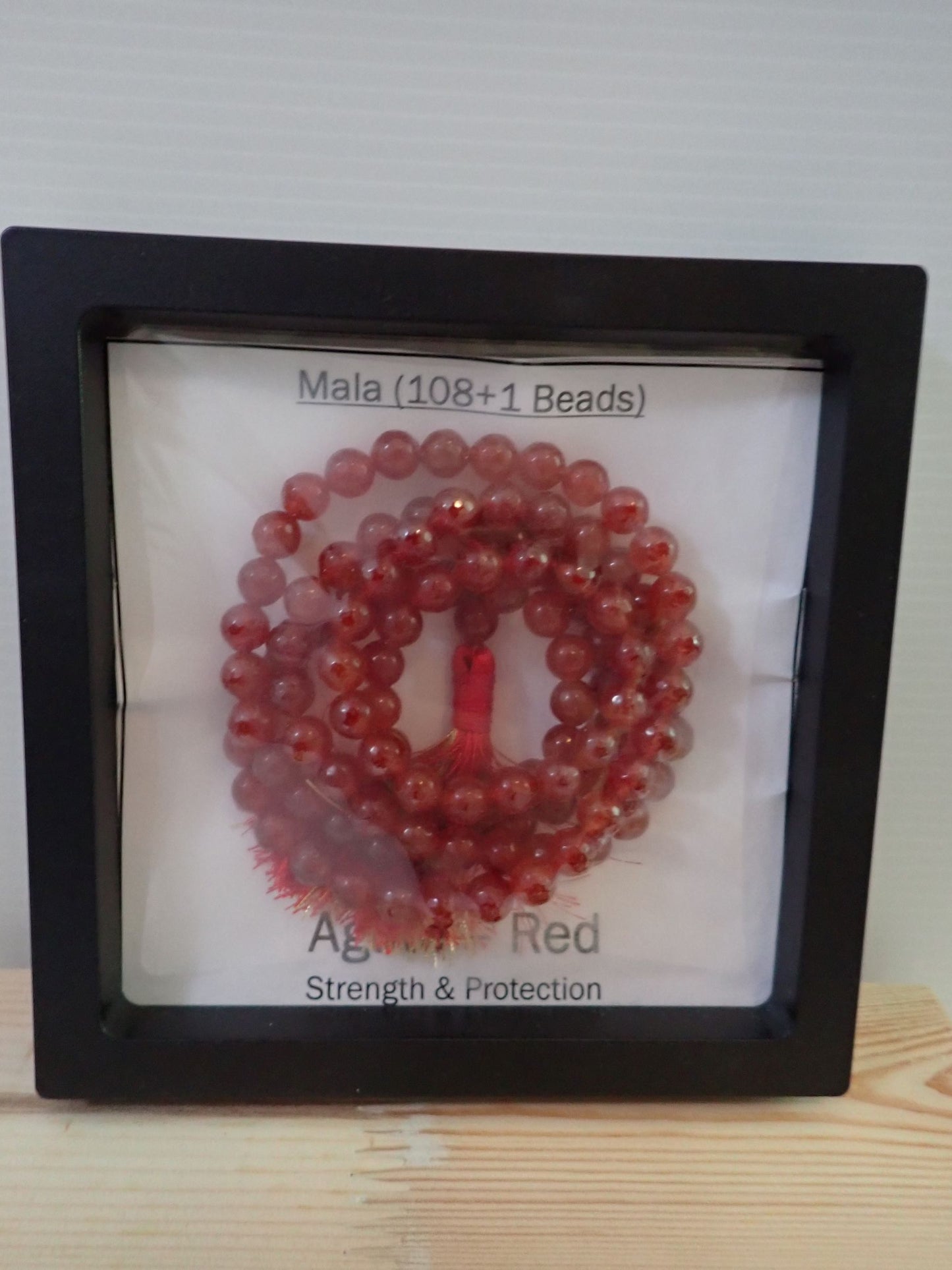 Red Agate Mala displayed in shadow box frame - Strength and Protection